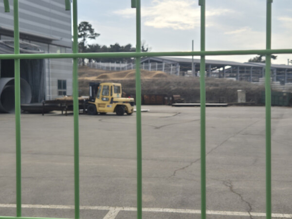 Construction equipment at a factory in Eumseong, North Chungcheong Province, stands still.